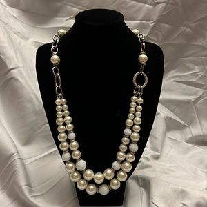 Silver and faux pearl necklace.